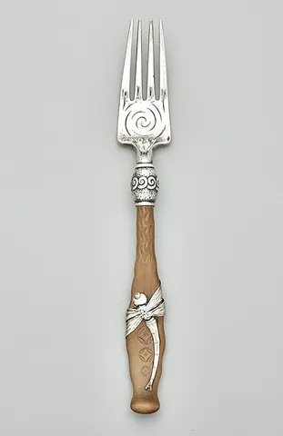 salad fork: a fork intended for use when eating salad, often shorter than a usual dinner fork and sometimes...