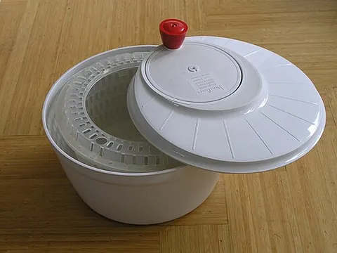 salad spinner: a tool using centrifugal force to wash and dry salad