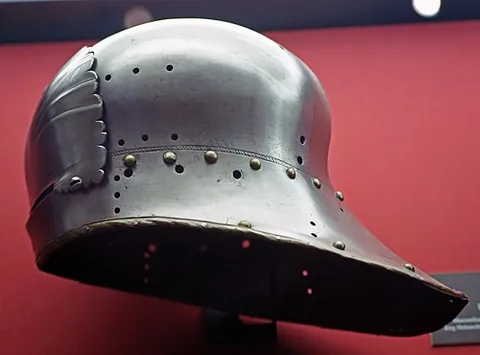 sallet: a type of light spherical combat helmet used in the 15th century