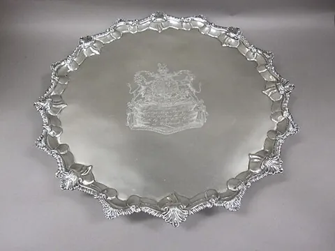 salver: one who salves or cures