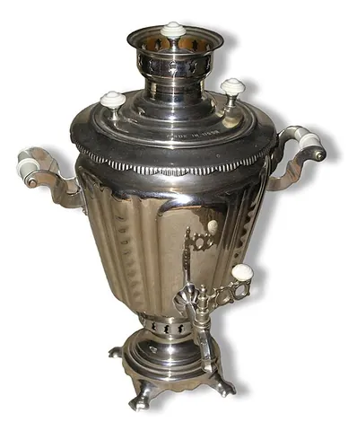 samovar: a metal urn with a spigot, for boiling water for making tea. Traditionally, the water is heated by...