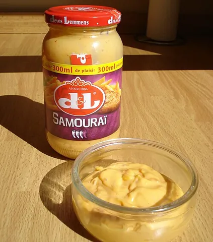 samurai sauce: a spicy Belgian condiment made with mayonnaise, ketchup, and harissa or sambal, commonly served...