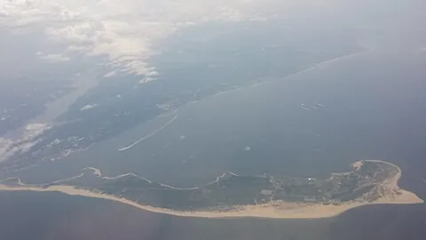 sandy hook: a spit (landform) on the coast of New Jersey, United States