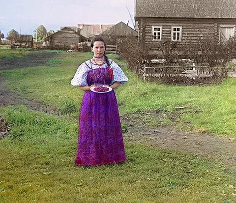 sarafan: a traditional long, trapeze-shaped Russian pinafore worn by women and girls