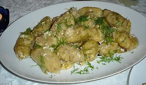 sarma: a dumpling of minced meat and other ingredients wrapped in a leaf (grape or cabbage)