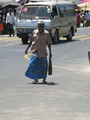 sarong: a garment made of a length of printed cloth wrapped about the waist that is commonly worn by men...