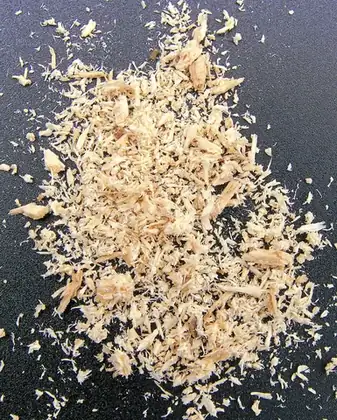 sawdust: the fine particles (dust) created by sawing wood or other material