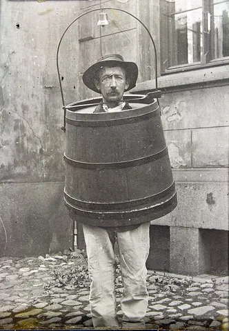 schandmantel: an instrument of punishment resembling a barrel that is worn as a coat to humiliate the wearer
