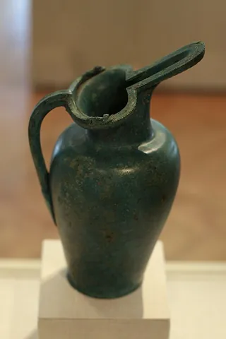 schnabelkanne: a ewer with a spout in the shape of a beak, of a kind initially made and used by the Etrurians