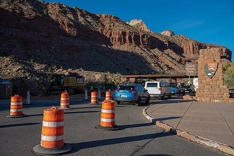 schneider egg: an orange traffic barrel or cone, used to mark construction zones or hazards on the road