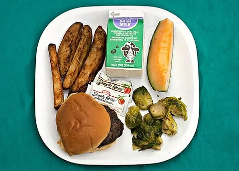 school meal: a meal, usually lunch, provided by an organization to attendees or participants, such as by a...
