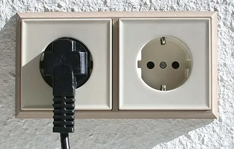 schuko: a type of electrical socket (or plug), consisting of two round holes (or pins) with ground contacts...