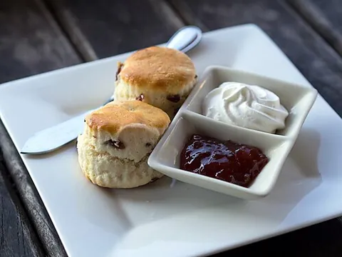 scone: a small, rich, pastry or quick bread, sometimes baked on a griddle