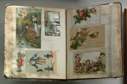 scrapbook: a book, similar to a notebook or journal, in which personal or family memorabilia and photos are...