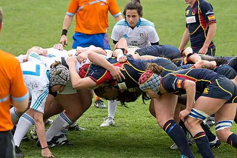 scrum-half: a player who introduces the ball into a scrum