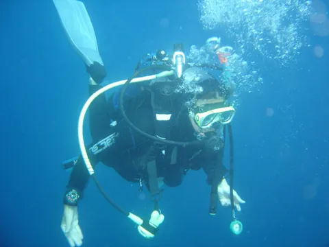 scuba: an apparatus carried by a diver, which includes a tank holding compressed, filtered air and a...
