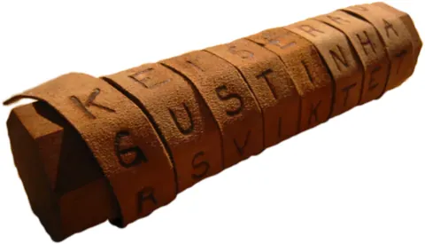 scytale: a cylinder with a strip of parchment wound around it on which a message is written, used for...