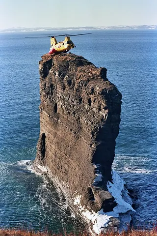 sea stack: a pillar of rock that rises from the ocean, formed by surrounding softer ground eroding away