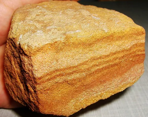 sedimentary rock: one of the major groups of rock that makes up the crust of the Earth; formed by the deposition of...