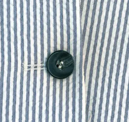 seersucker: a thin, all-cotton fabric, commonly striped, used to make clothing for summer wear
