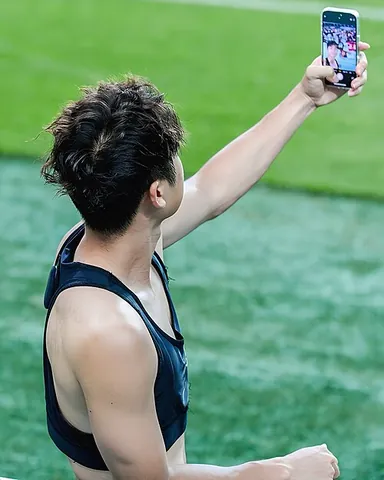 selfie: a photographic self-portrait, especially one taken manually (not using a timer, tripod etc.) with a...