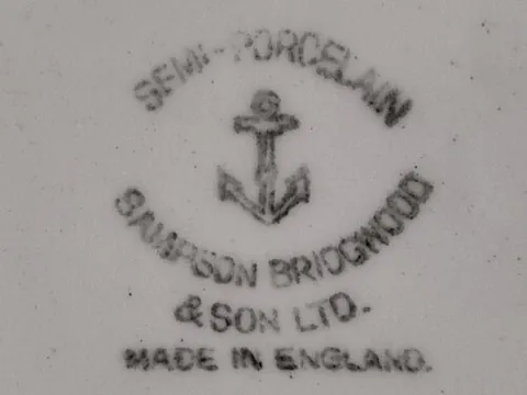 semiporcelain: any of several glazed ceramic wares resembling porcelain but having little or no translucency