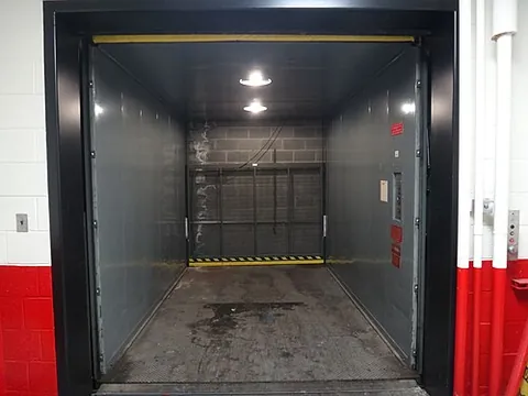 service lift: a lift designed to carry heavy goods in a place of business