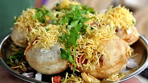 sev puri: an Indian snack and a type of chaat, resembling panipuri, consisting of small, round puris or flat...