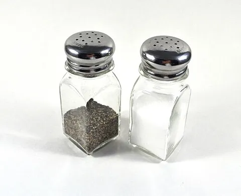 shaker: a person or thing that shakes, or by means of which something is shaken