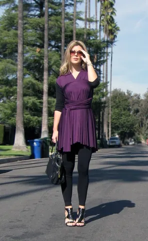 shark bite: having a hemline that curves inward in a deep, symmetrical vee