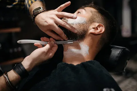 shave: to make (the head, skin etc.) bald or (the hair) shorter by using a tool such as a razor or...