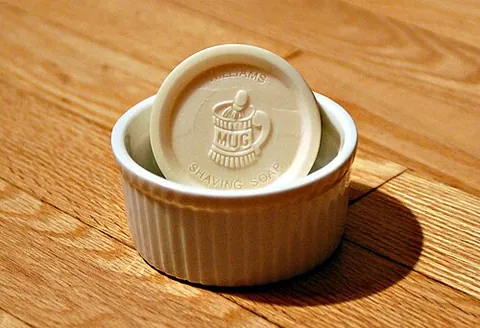 shaving soap: a type of hard soap used with water and a shaving brush to create a lather that provides...