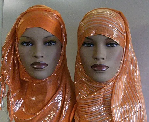 shayla: a traditional Islamic headcovering worn by some Muslim women to observe sartorial hijab; typically...