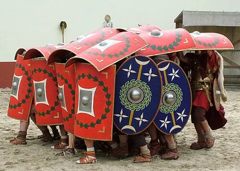 sheltron: a compact body of troops forming a battle array or phalanx, especially such a body of Scottish...