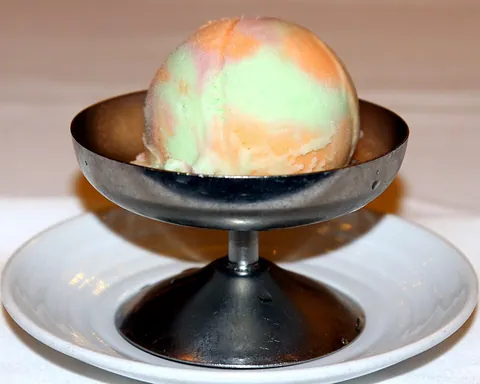 sherbet: a dessert of frozen fruit juice with a dairy product such as milk added; a sorbet with dairy...