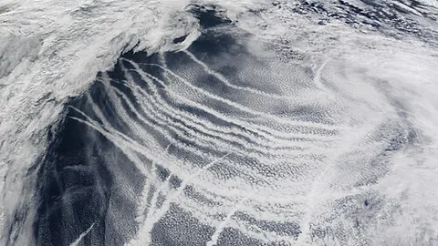 ship tracks: long, narrow, white clouds formed when the exhaust from ships interacts with atmospheric water vapor
