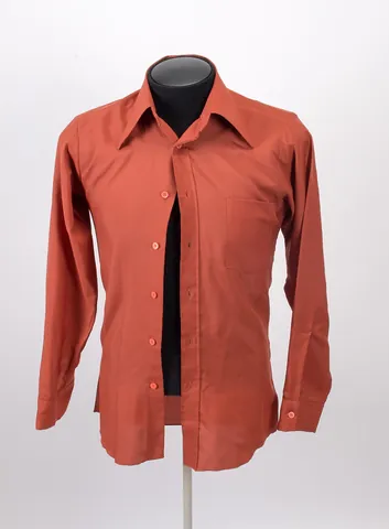 shirt: an article of clothing that is worn on the upper part of the body, often with sleeves that cover...