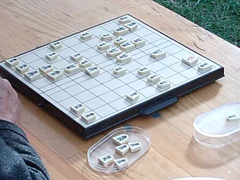 shogi: japanese chess; a board game similar to chess, invented and traditionally played in Japan
