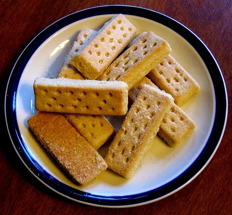 shortbread: a type of biscuit (cookie), popular in Britain, traditionally made from one part sugar, two parts...