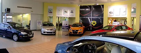 showroom: a room in a business set aside for the display of the company's products