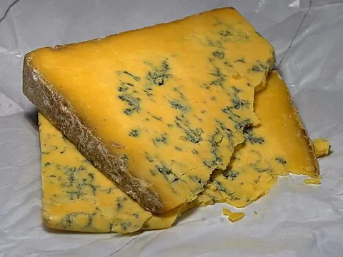 shropshire blue: a kind of blue cheese made from cow's milk and coloured with annatto