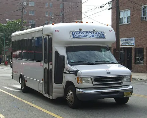 shuttle bus: a short-haul minibus, typically privately owned, that shuttles passengers between set locations