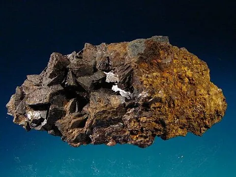 siderite: a widespread brown mineral, FeCO₃, having the structure of calcite