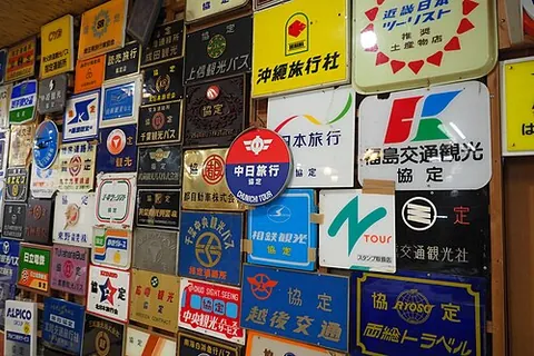 signage: signs, particularly those imparting commercial, directional, or road traffic information, taken...