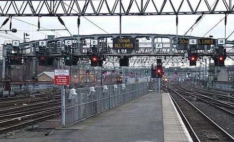 signal gantry: a structure erected over one or more railway tracks, carrying one or more signals. Smaller...