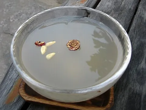 sikhye: a sweet beverage made from barley and rice, sometimes served with pine nuts
