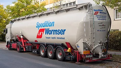 silo truck: a commercial truck carrying free-flowing bulk products in its own silo (a type of truck)