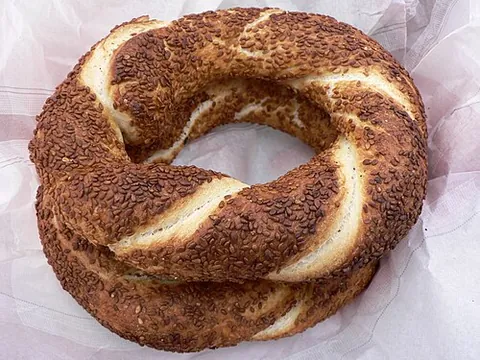 simit: a ring-shaped bread roll covered with sesame seeds
