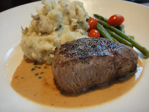 sirloin: a cut of beef from the lower part of the back, where the last ribs are (called rump in UK English)
