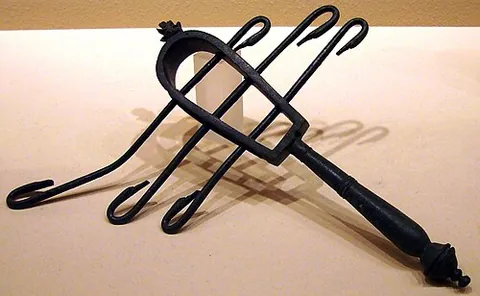 sistrum: an ancient Egyptian musical instrument, to be shaken, consisting of a metal frame holding...
